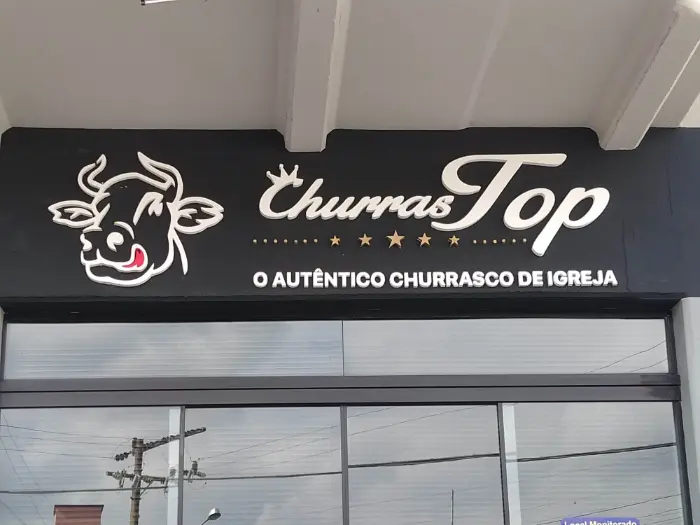Letreiro externo com logotipo de touro, para fachada de restaurante